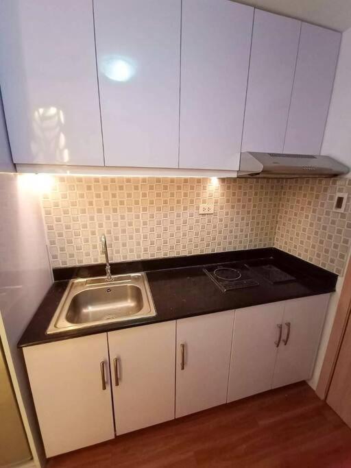 Cozy Studio Unit At Sun Residences Кесон-Сіті Екстер'єр фото