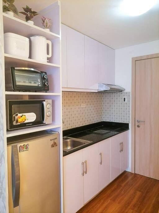 Cozy Studio Unit At Sun Residences Кесон-Сіті Екстер'єр фото